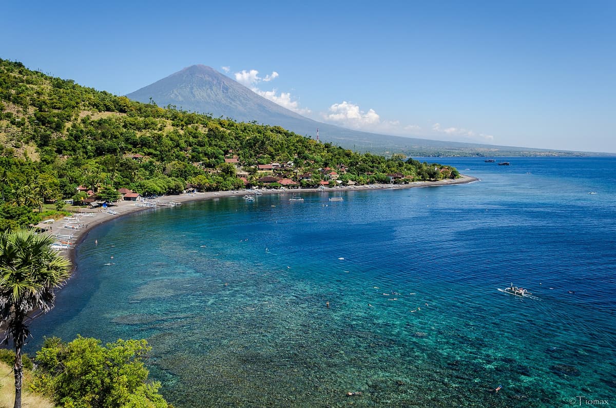 Amed, East Bali | Bali | Go Bali Visa Agency Fishing boats on the black-sand coast of Amed in East Bali, a diving village
