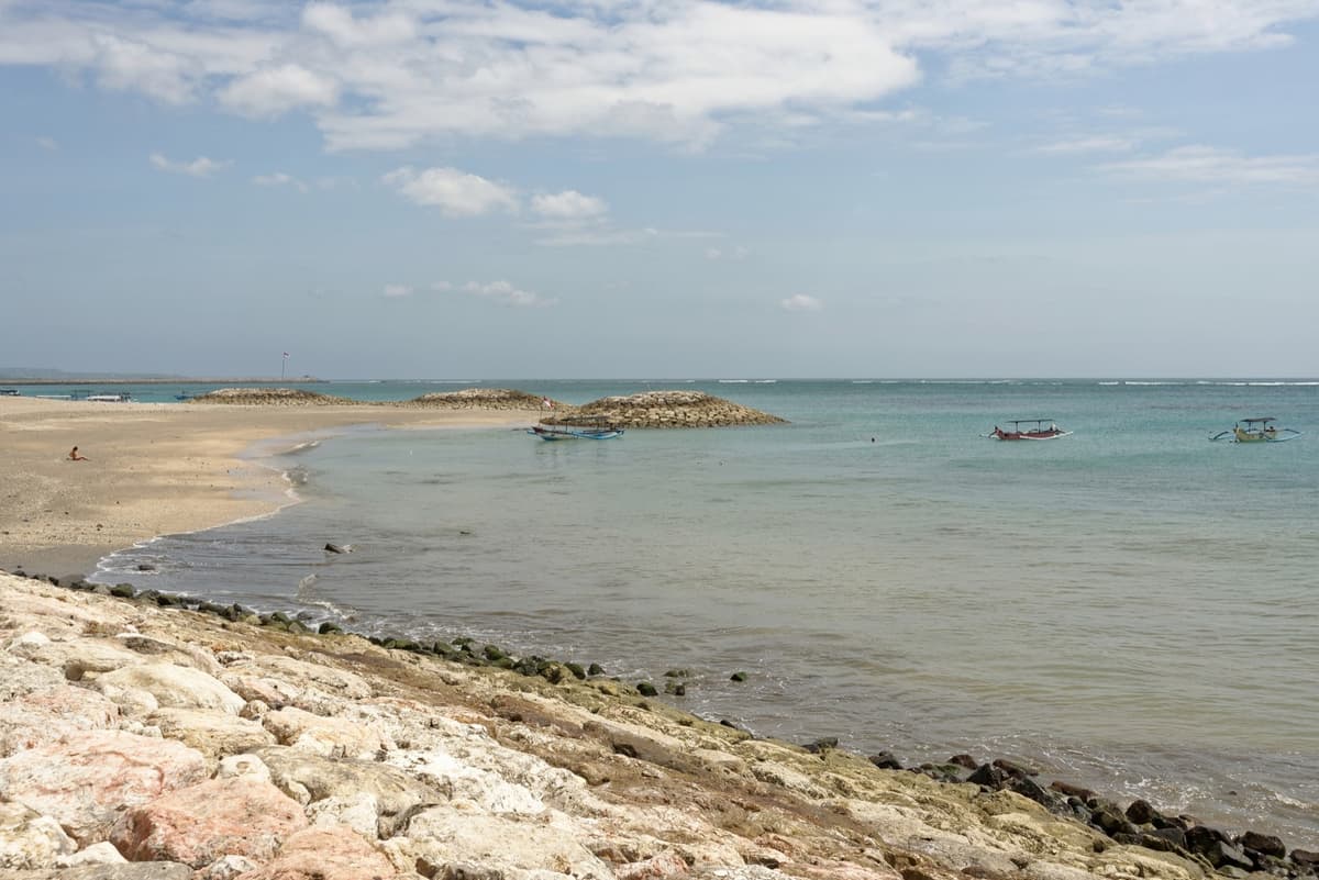 Jerman Beach, Kuta | Bali | Go Bali Visa Agency Wide sandy shoreline at Jerman Beach in Kuta, Bali