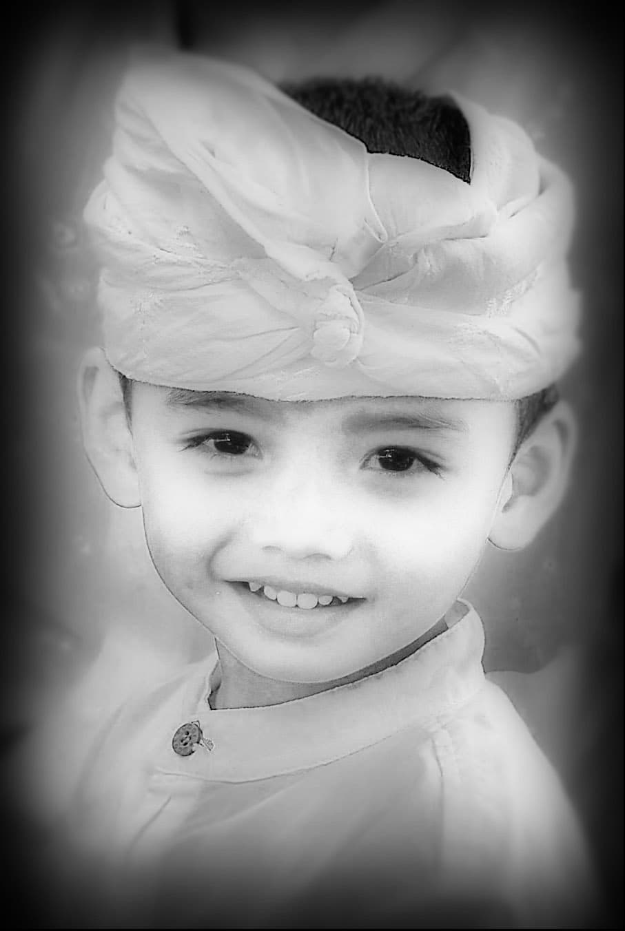 Odalan temple festival | Bali | Go Bali Visa Agency A Balinese Hindu boy in traditional ceremonial dress for a village temple Odalan festival