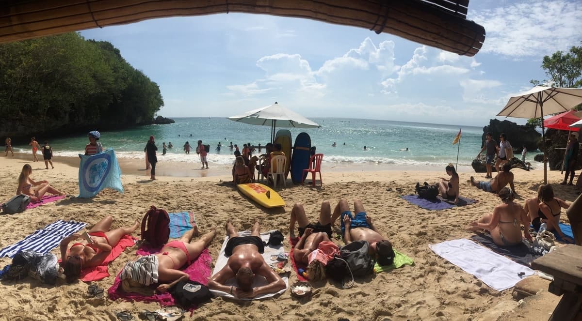 Padang Padang Beach | Bali | Go Bali Visa Agency Turquoise cove and limestone cliffs at Padang Padang Beach, Bali