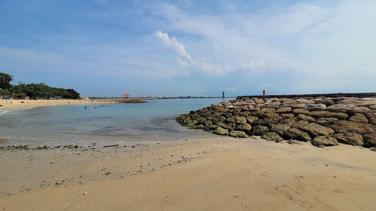 Sanur Beach | Bali | Go Bali Visa Agency Calm shoreline and outrigger boats at Sanur Beach, Bali
