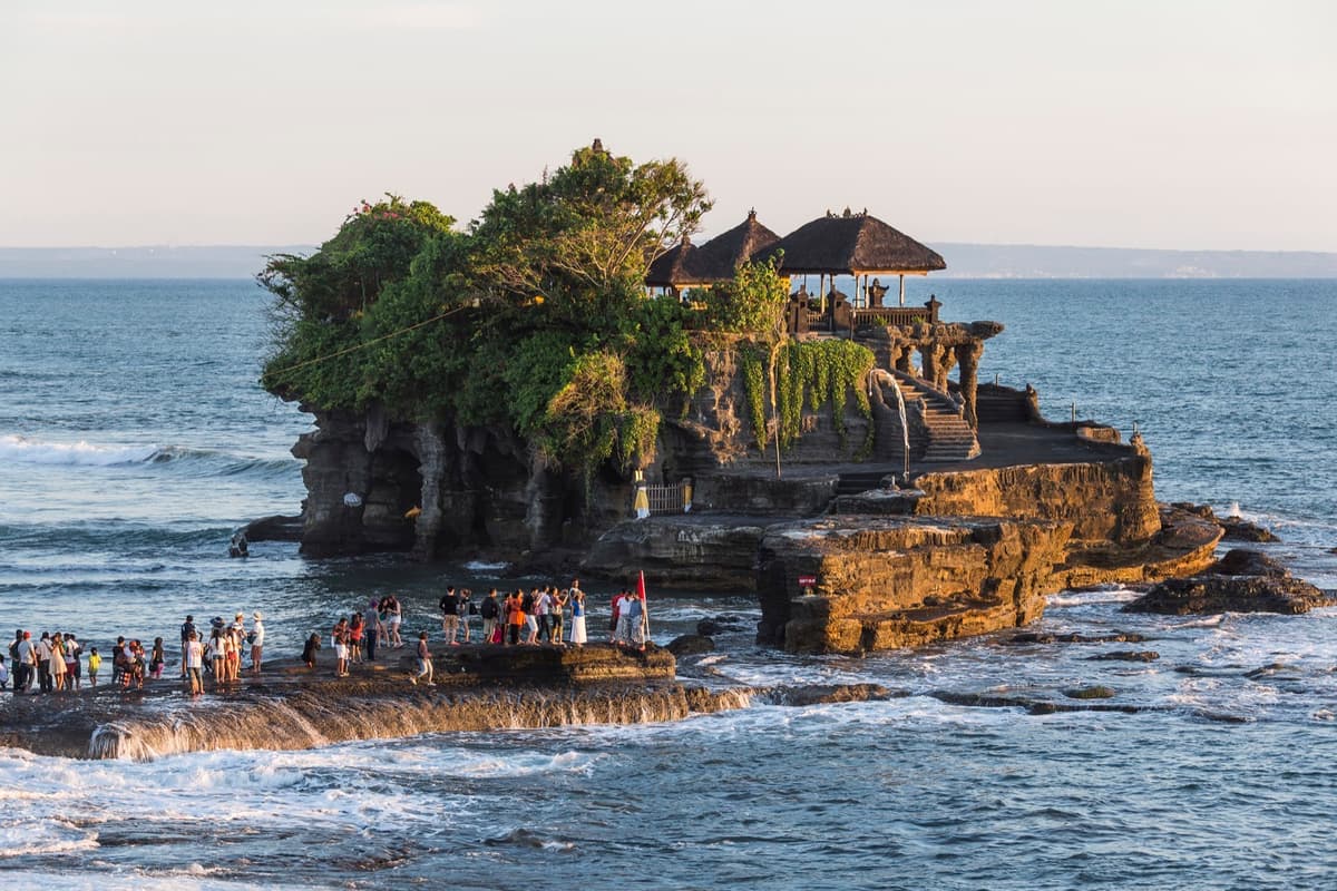 Tanah Lot Temple at sunset | Bali | Go Bali Visa Agency Tanah Lot sea temple on a rock at sunset on Bali's west coast
